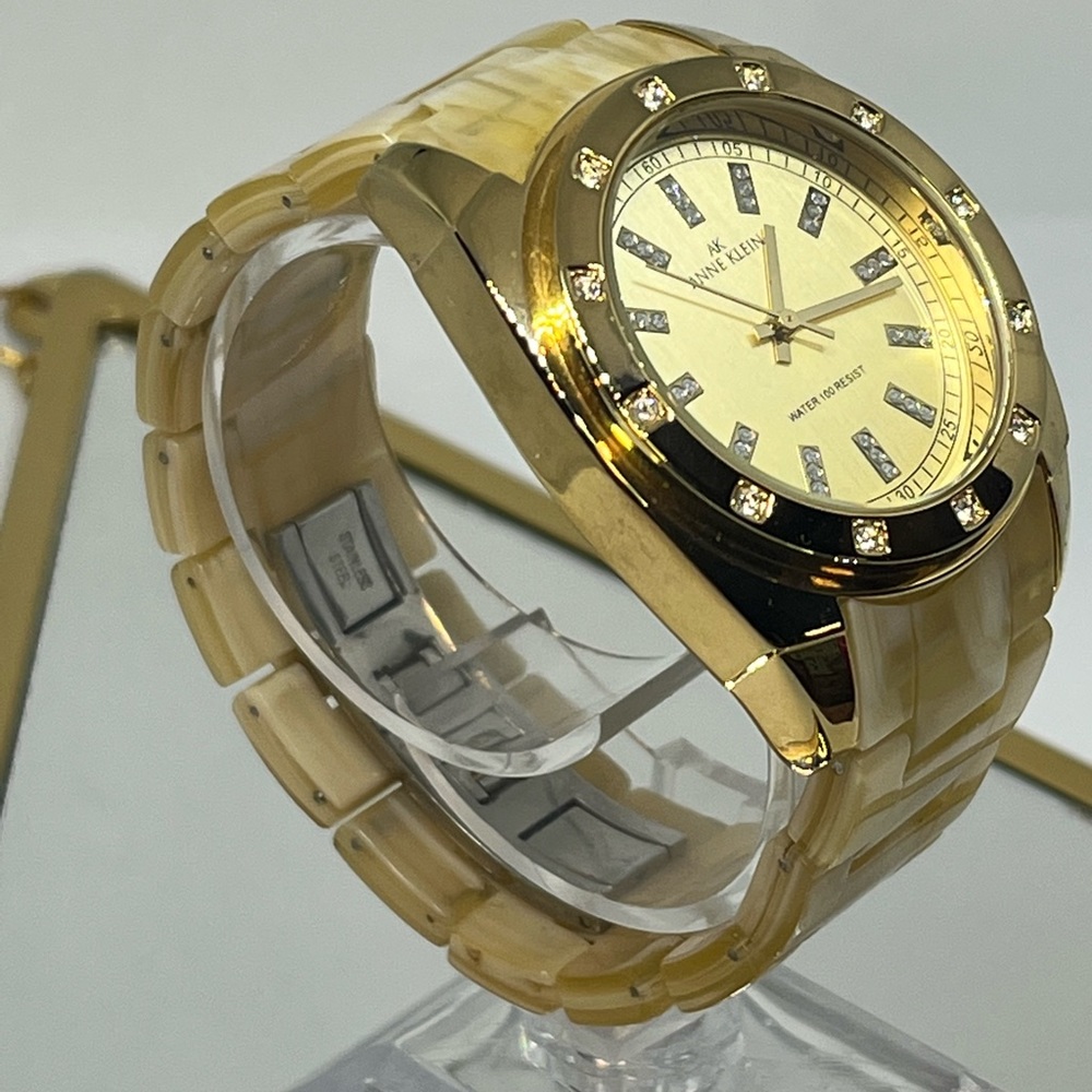 ANNE KLEIN brand very sleek looking watch acrylic band with gold tone face 6 1/4